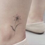 70 Meaningful Lily Tattoo Designs for Women Ideas 04