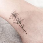 70 Meaningful Lily Tattoo Designs for Women Ideas 09