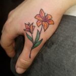 70 Meaningful Lily Tattoo Designs for Women Ideas 24