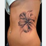 70 Meaningful Lily Tattoo Designs for Women Ideas 26